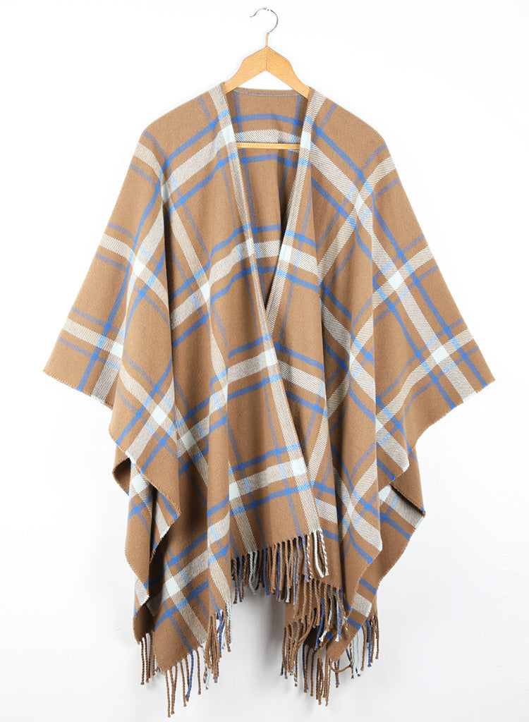 A checked wool cape with a cinnamon ground, highlighted by sky and cobalt blue.