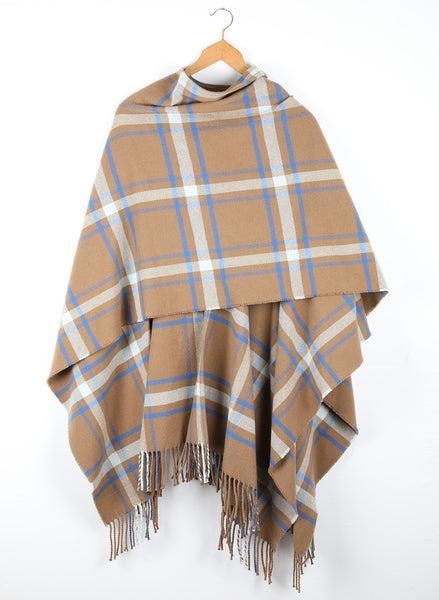 A checked wool cape with a cinnamon ground, highlighted by sky and cobalt blue.