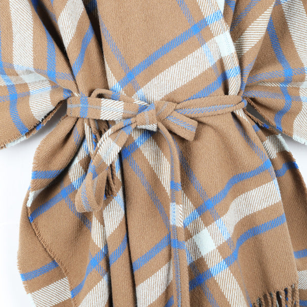A checked wool cape with a cinnamon ground, highlighted by sky and cobalt blue.