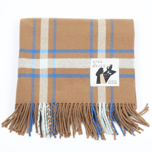 A checked wool shawl/stole with a cinnamon ground, highlighted by sky and cobalt blue.