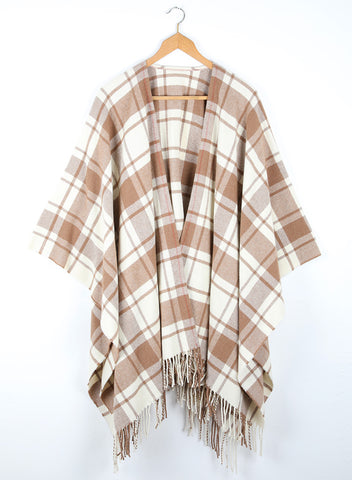 A wool cape with a simple check of natural white and caramel.