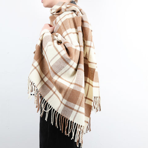 A wool shawl/stole with a simple check of natural white and caramel.