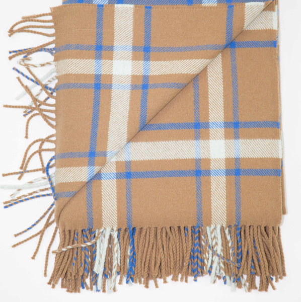 A checked wool throw in cinnamon, beige, brown and blue, cobalt