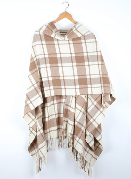 A wool cape with a simple check of natural white and caramel.