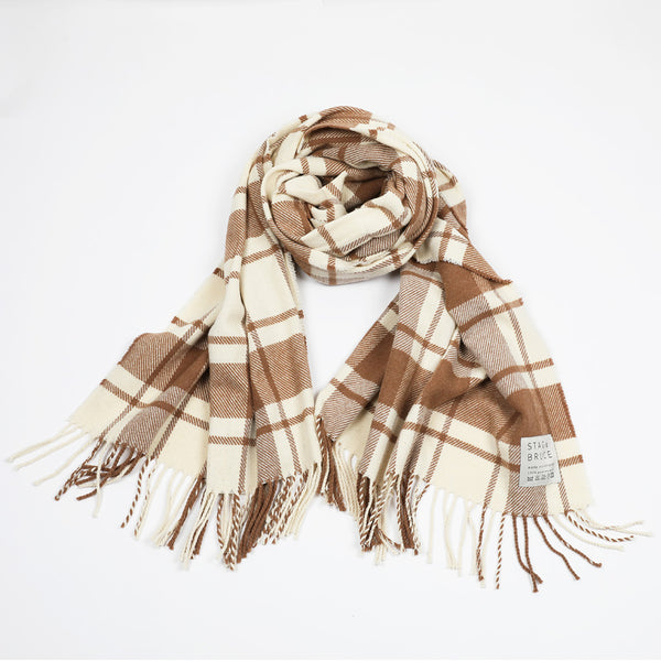 A wool shawl/stole with a simple check of natural white and caramel.